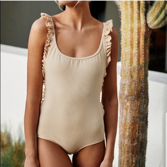 made by dawn x goop ruffle petal one piece nude